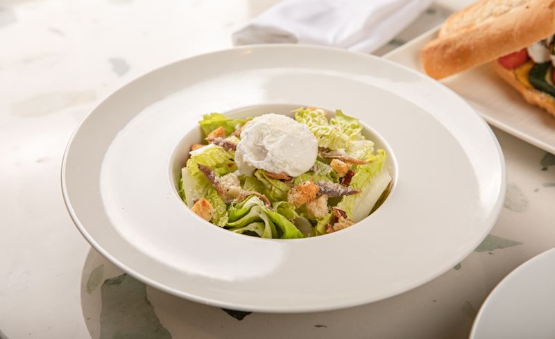 Classic Caesar salad with croutons and Parmesan